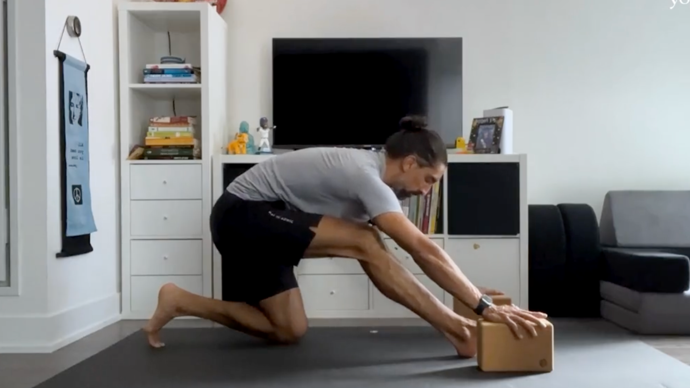 Yoga teacher Jaffer Hussain in Half Splits, Ardha Hanumanasana in Sanskrit, one of his series of hip stretches